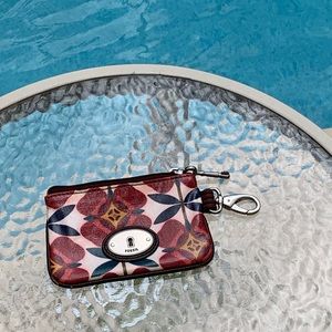 Fossil wallet with lobster clasp.